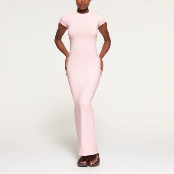 skims pink cherry dress The internet's obsessed with this dress, and you will be too. Shop our viral Soft Lounge in Cherry Blossom pink. Penny wears the Soft Lounge Long Slip Dress, size S, in Cherry